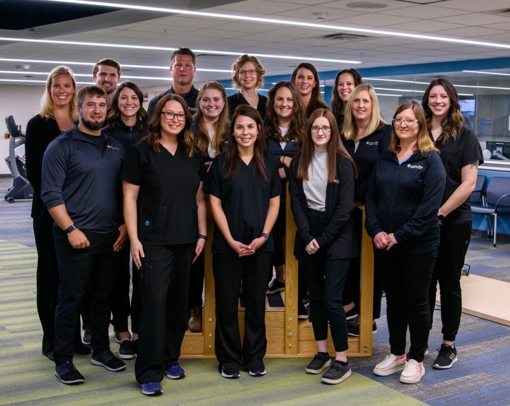 Photo shows the Mankato Clinic Physical Therapy team in a PT gym at our Main Street Clinic location